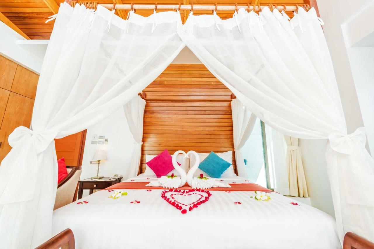 윈덤 씨 펄 리조트 푸켓  Patong 외부 사진 A bed with a canopy